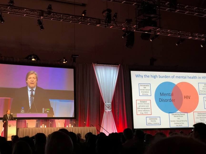 Photo of Robert Remien presenting